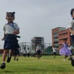 Students running during physical education class